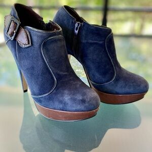 Elegant Navy Heeled Boots with Brown Trim